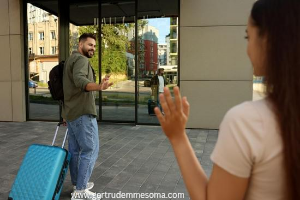 Lady-waving-bye-to-her-husband-in-long-distance-marriage